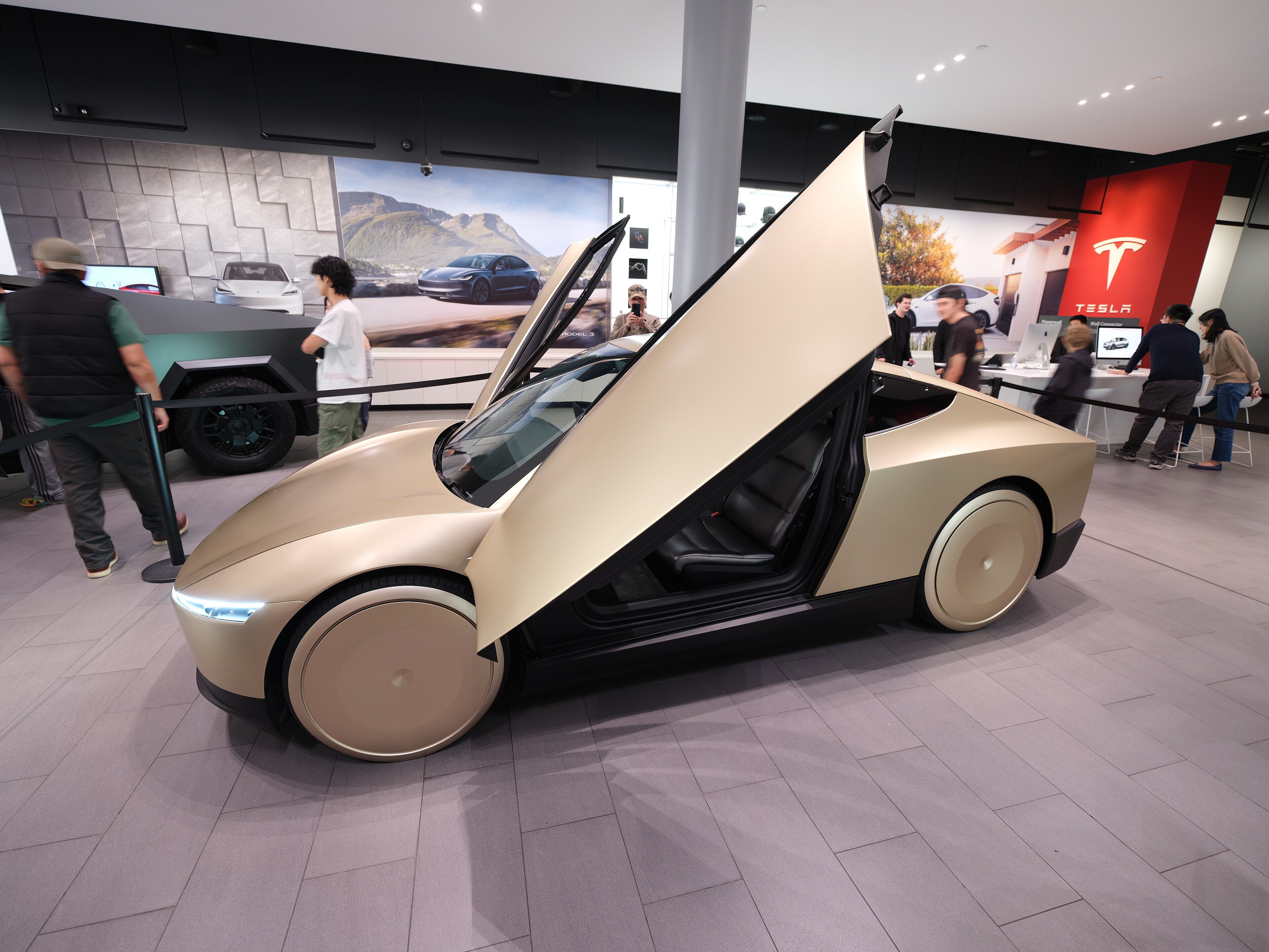 Tesla Cybercab, the two-seat autonomous robotaxi, on a city street